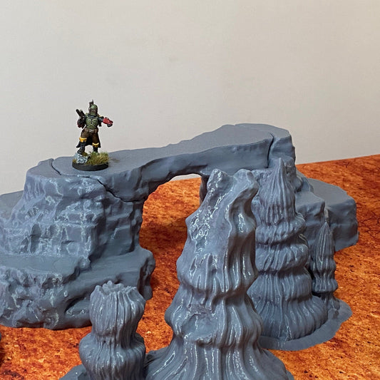 Figure depicting Boba Fett standing on genosian desert rocks